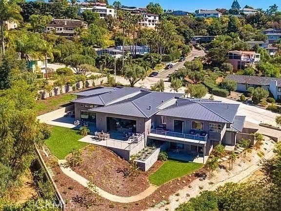 A property available for sale at 7734 Esterel Drive, La Jolla, CA 92037.