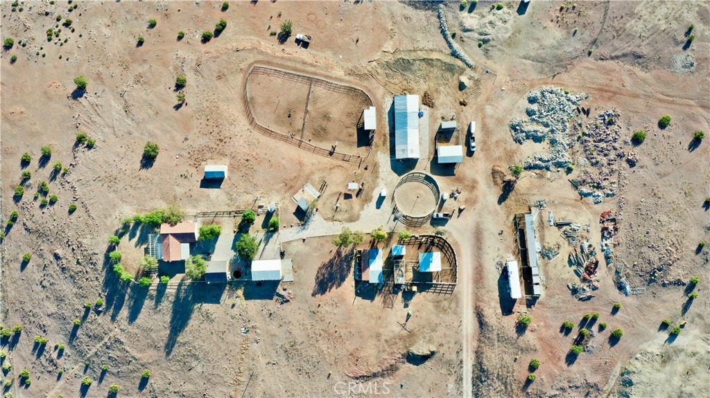 A property available for sale at 2215 Moonshadow Ranch Road, Palmdale, CA 93550.