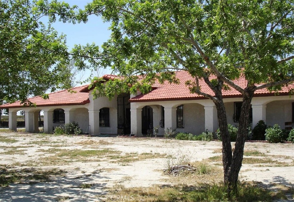 A property available for sale at 6888 Bookasta Road, Adelanto, CA 92301.