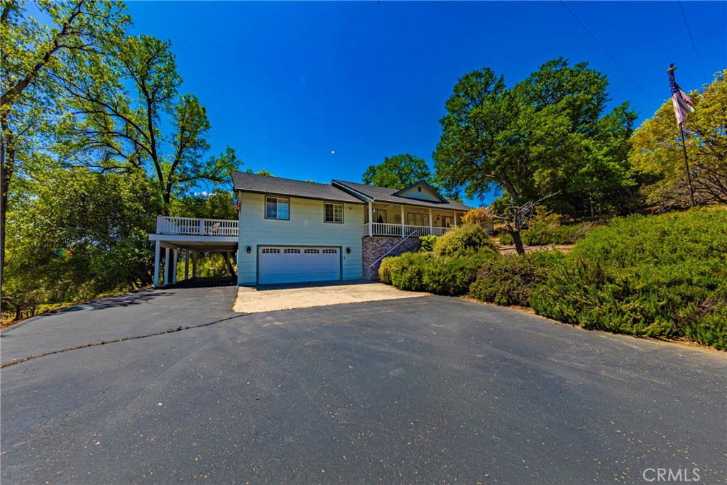 A property available for sale at 41715 River Falls Road, Oakhurst, CA 93644.