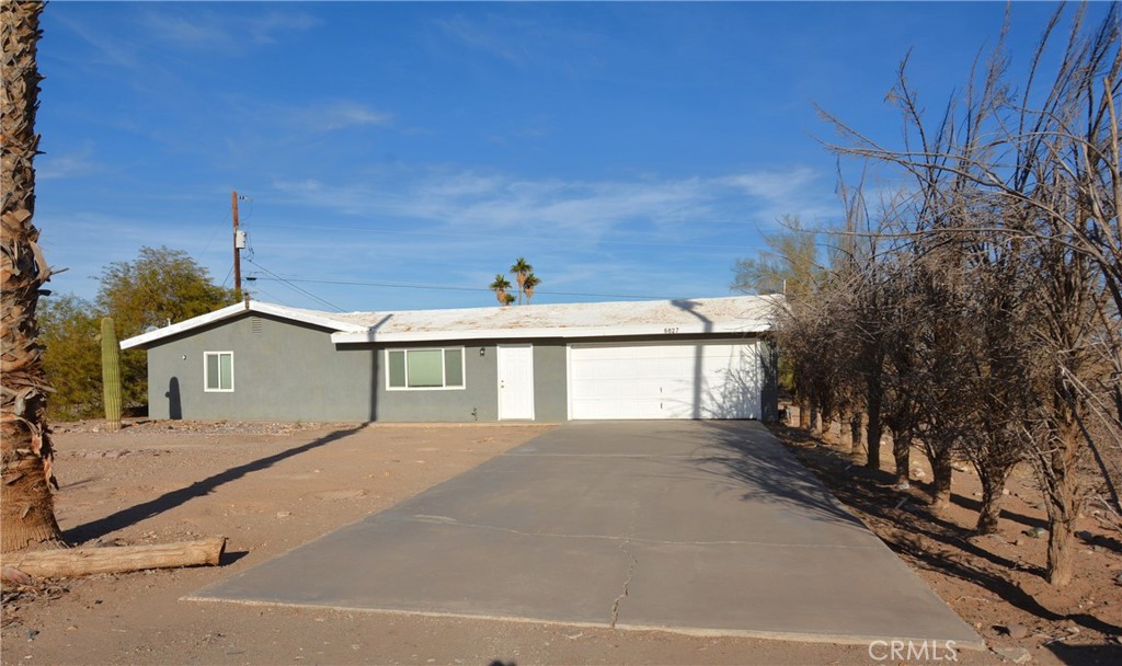 A property available for sale at 6827 Mesquite Court, Big River, CA 92242.