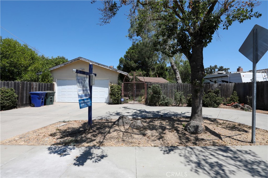 A property available for sale at 2409 Edgebrook Drive, Modesto, CA 95354.