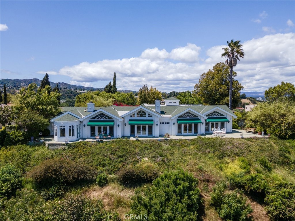 A property available for sale at 15589 Briarwood Drive, Sherman Oaks, CA 91403.