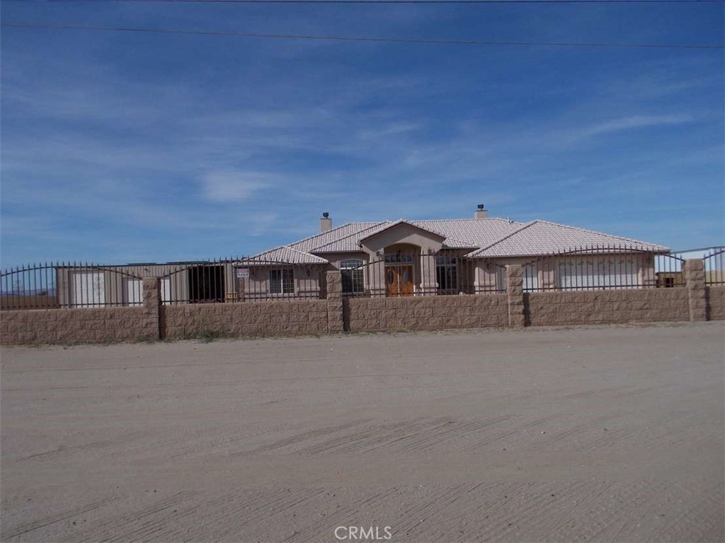 A property available for sale at 11830 Joshua Dell Road, Victorville, CA 92371.