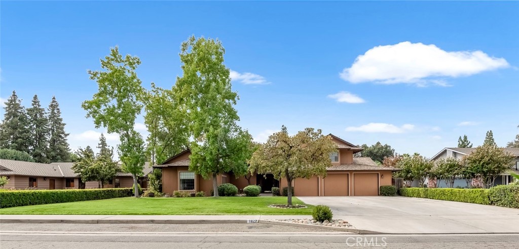 A property available for sale at 1827 S Teddy Street, Visalia, CA 93277.