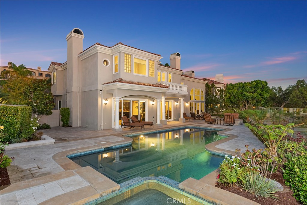 A property available for sale at 49 Poppy Hills Road, Laguna Niguel, CA 92677.