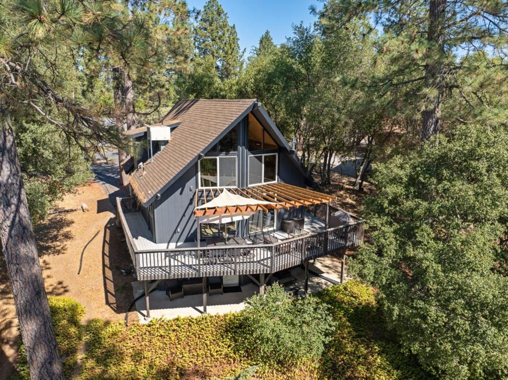 A property available for sale at 20779 Point View Drive, Groveland, CA 95321.