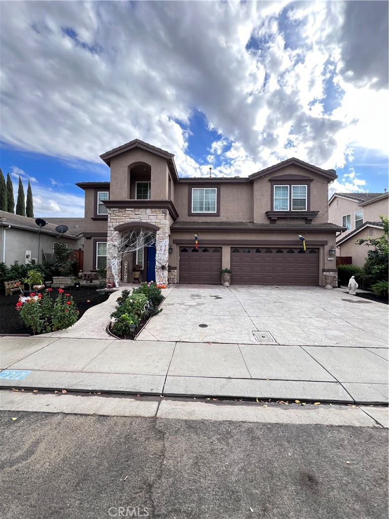 A property available for sale at 2212 Pan Shell Court, Modesto, CA 95356.