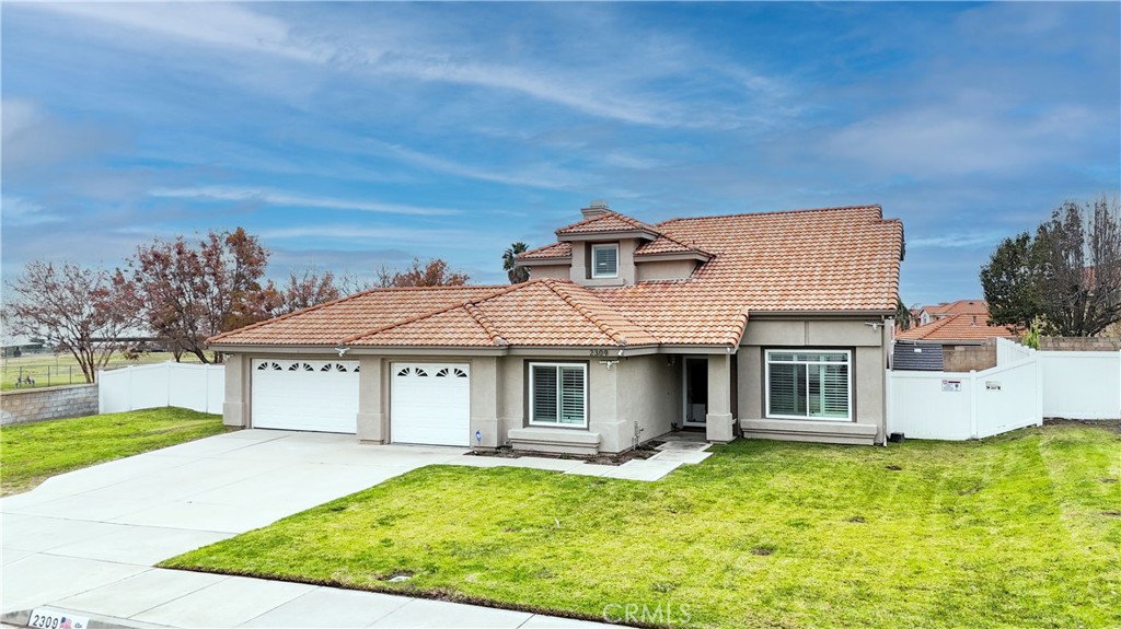 A property available for sale at 2309 W Via Bello Drive, Rialto, CA 92377.