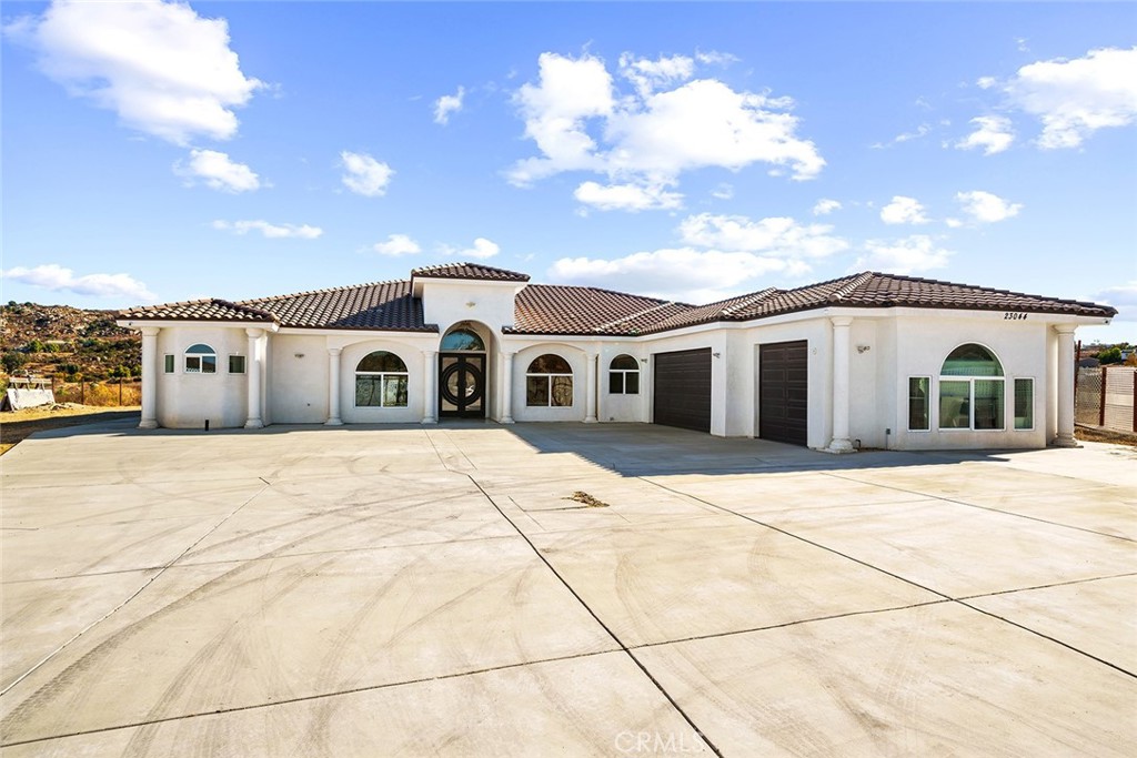 A property available for sale at 23044 Juniper Flats Road, Nuevo, CA 92567.