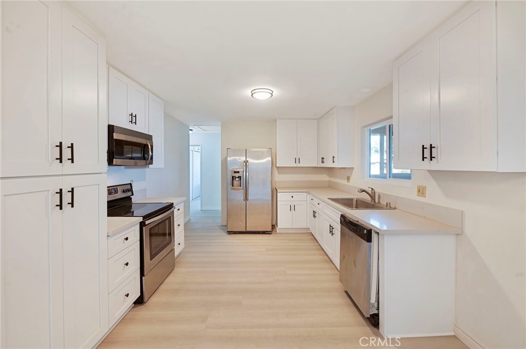 A property available for sale at 19665 Grey Mountain Road, Adelanto, CA 92301.