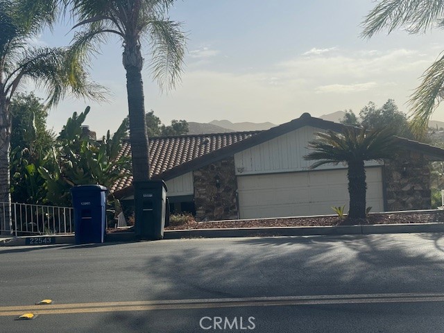 A property available for sale at 22543 Canyon Club Drive, Canyon Lake, CA 92587.