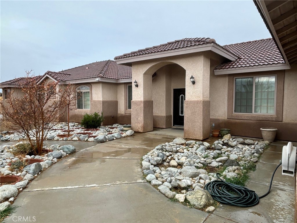 A property available for sale at 9392 Valencia Street, Phelan, CA 92371.