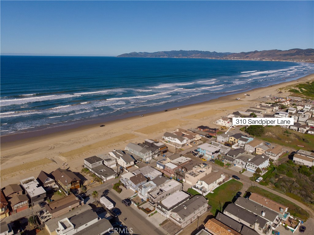 A property available for sale at 310 Sandpiper Lane, Oceano, CA 93445.