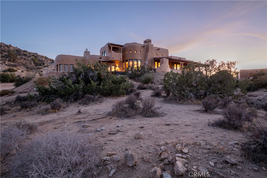 A property available for sale at 5597 Acoma Trail, Yucca Valley, CA 92284.