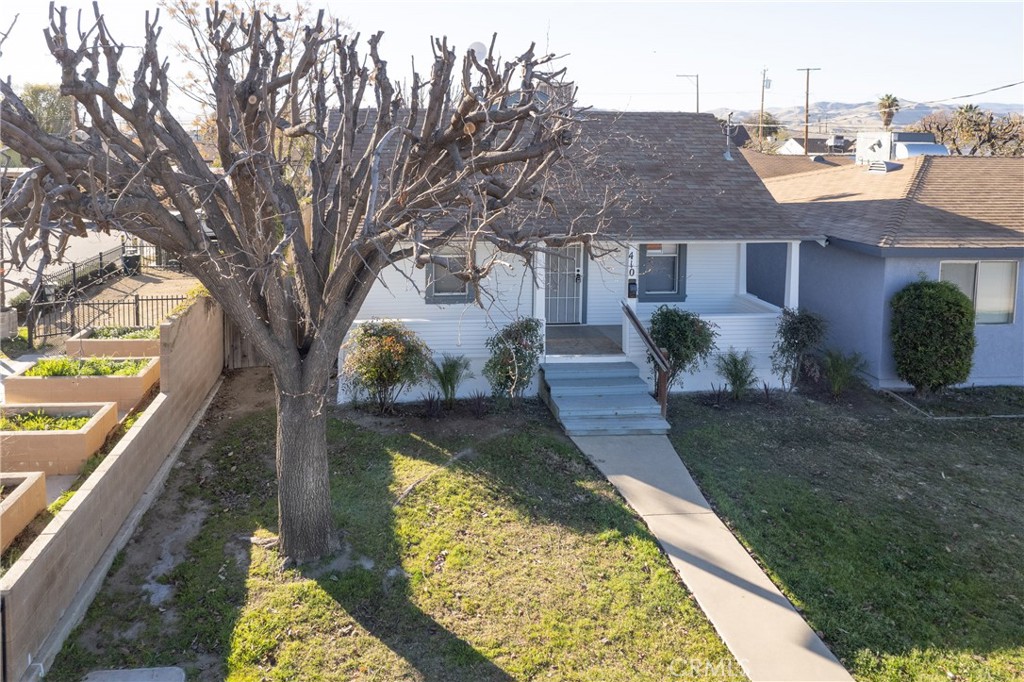A property available for sale at 410 E Polk Street, Coalinga, CA 93210.