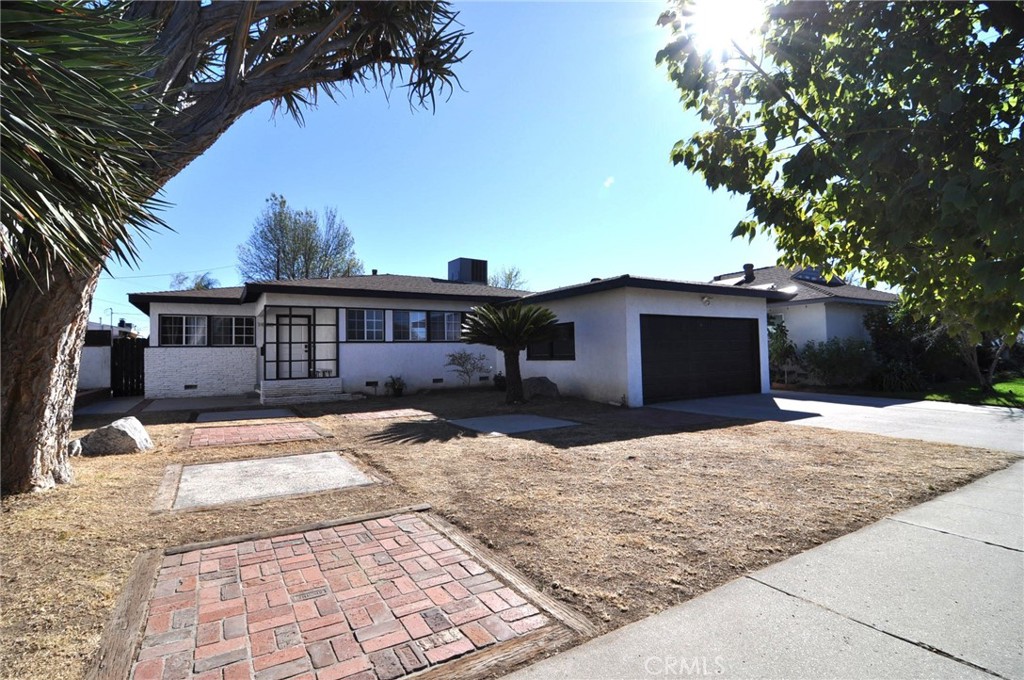 A property available for sale at 14080 Garber Street, Arleta, CA 91331.