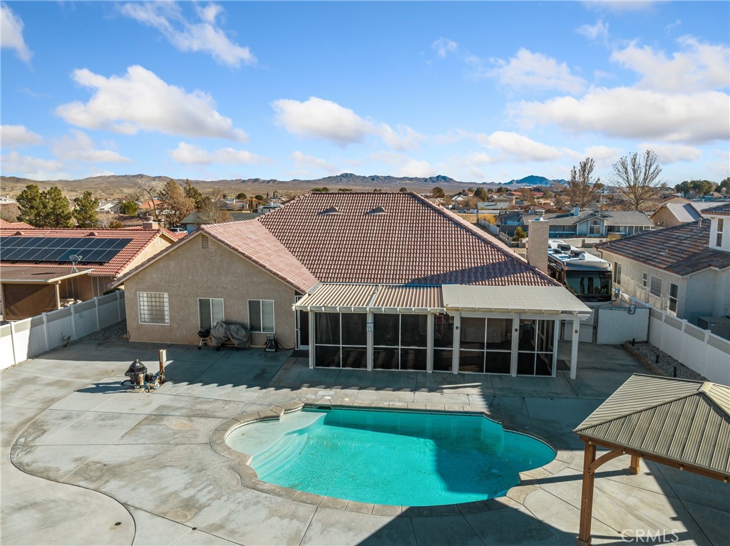 A property available for sale at 14096 Branding Iron Drive, Helendale, CA 92342.