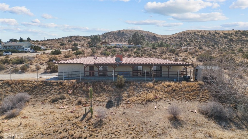 A property available for sale at 31350 157th Street E, Llano, CA 93544.