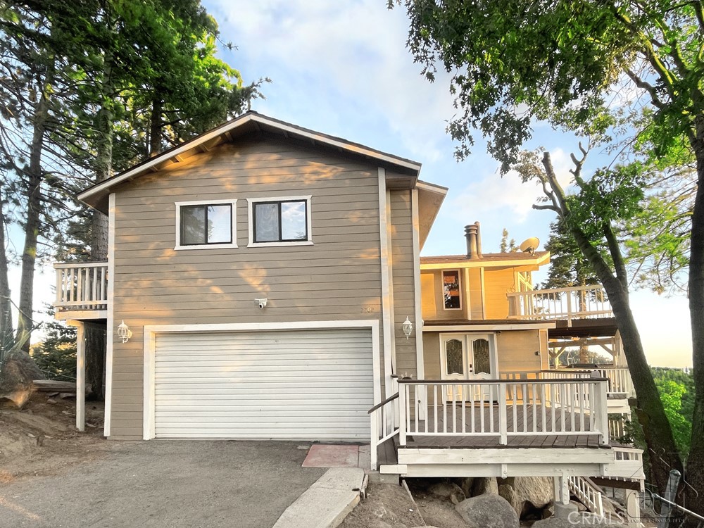 A property available for sale at 2702 Thule Lane, Running Springs, CA 92382.