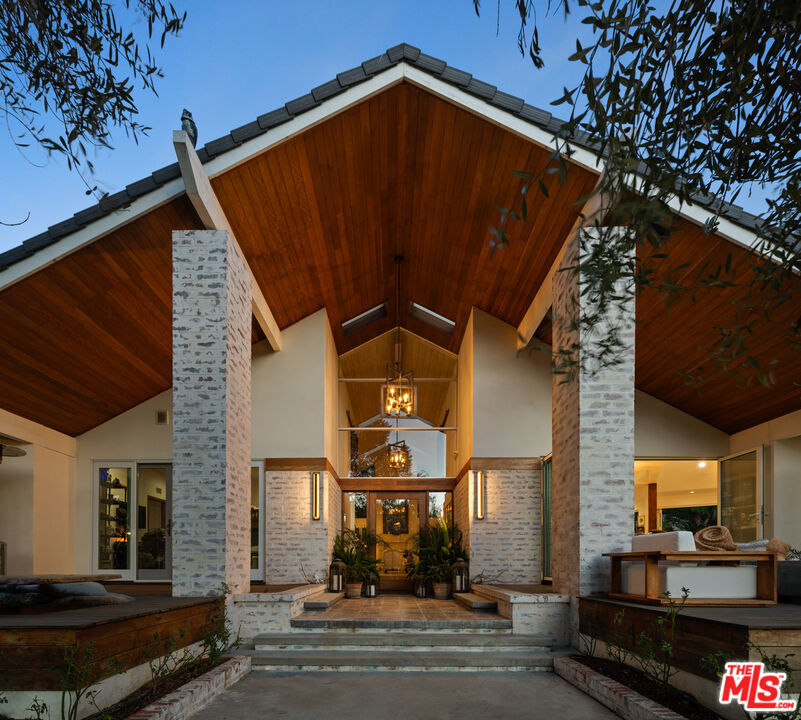A property available for sale at 3410 Serra Road, Malibu, CA 90265.