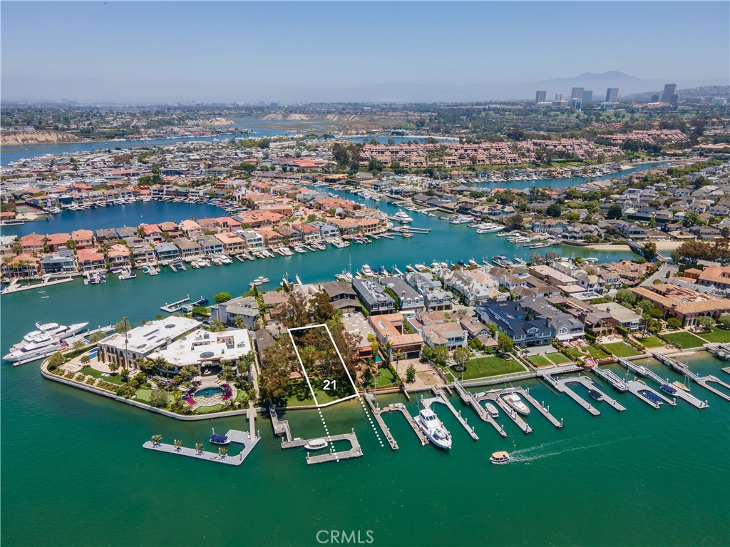 A property available for sale at 21 Harbor Island, Newport Beach, CA 92660.