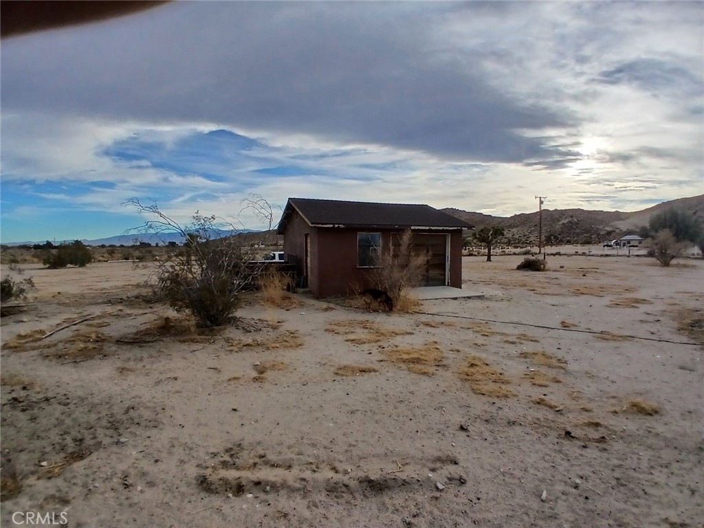 A property available for sale at 20273 Grey Mountain Road, El Mirage, CA 92301.