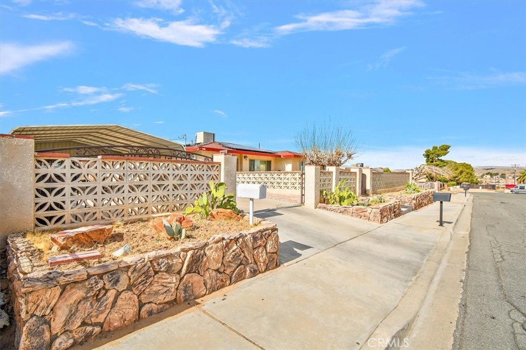 A property available for sale at 1230 Sunshine Drive, Barstow, CA 92311.
