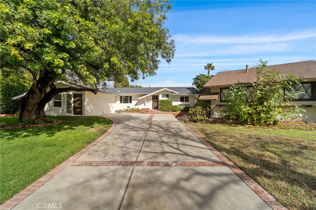 A property available for sale at 7942 Moorcroft Avenue, Canoga Park, CA 91304.