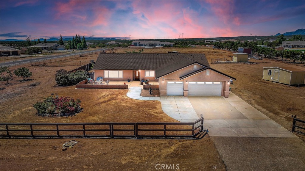 A property available for sale at 9275 Rattlesnake Road, Phelan, CA 92371.