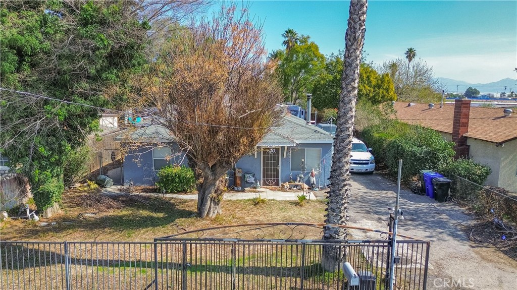 A property available for sale at 10917 Locust Avenue, Bloomington, CA 92316.