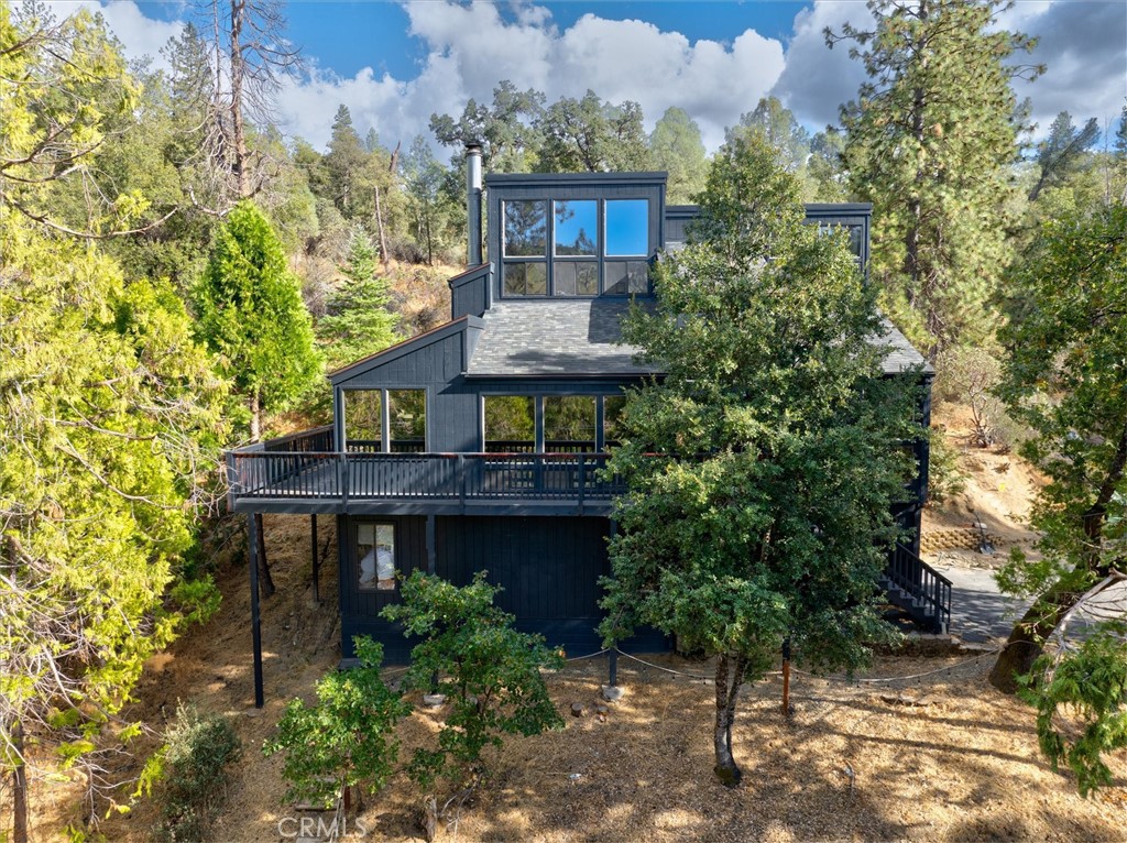 A property available for sale at 42893 Scenic Drive, Oakhurst, CA 93644.
