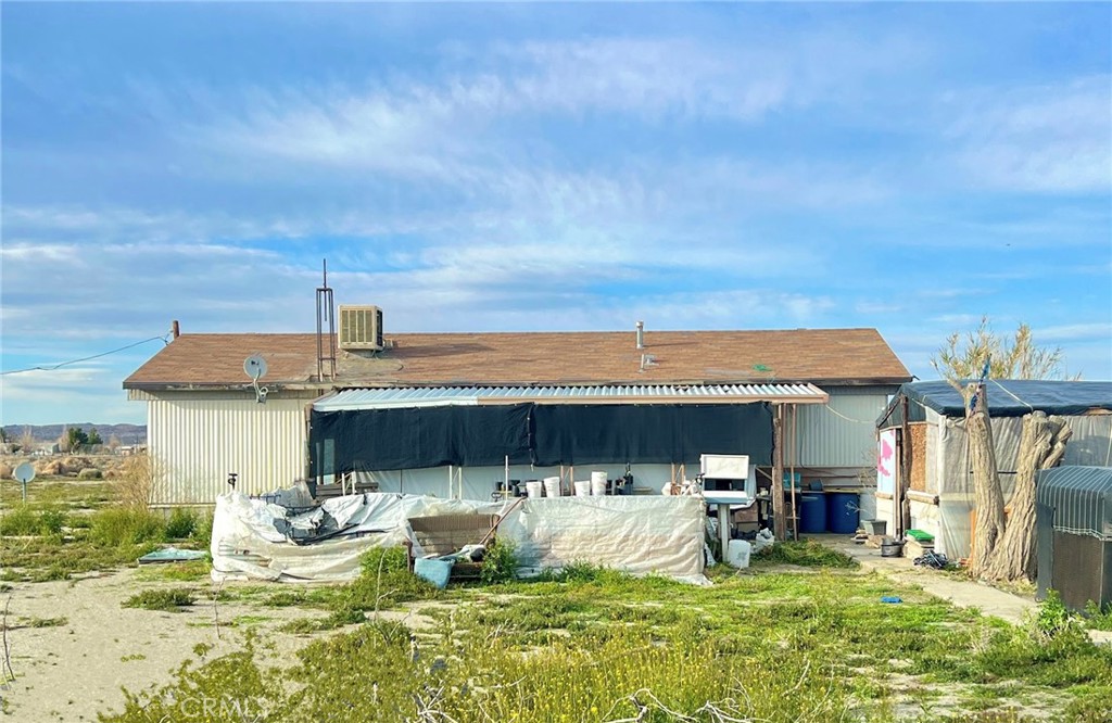 A property available for sale at 1212 Smith Road, El Mirage, CA 92301.