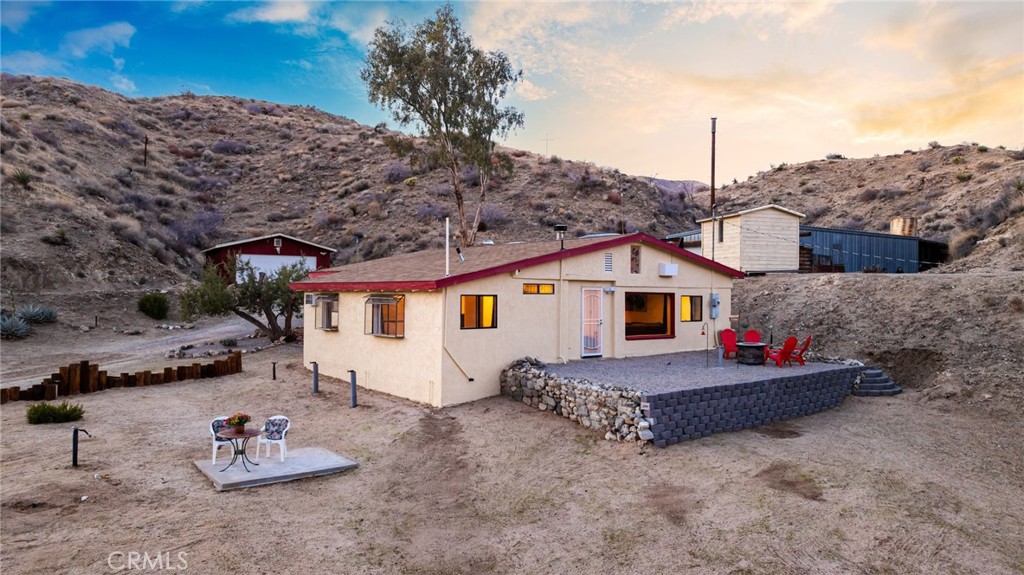 A property available for sale at 48754 Canyon House Road, Morongo Valley, CA 92256.