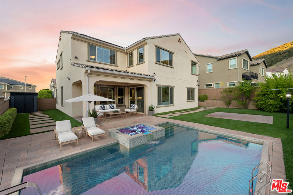 A property available for sale at 24236 W Stone Bend Lane, West Hills, CA 91304.