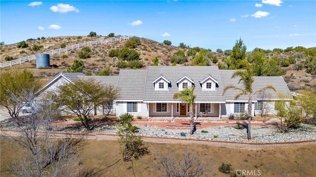 A property available for sale at 6990 Escondido Canyon Road, Acton, CA 93510.