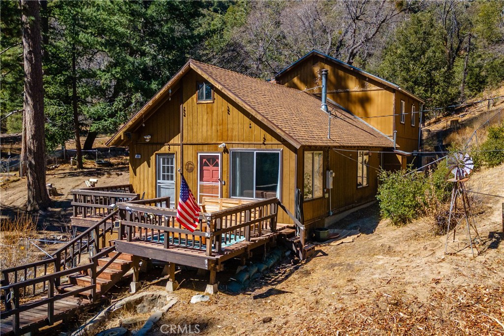 A property available for sale at 5958 Robin Oak Drive, Angelus Oaks, CA 92305.