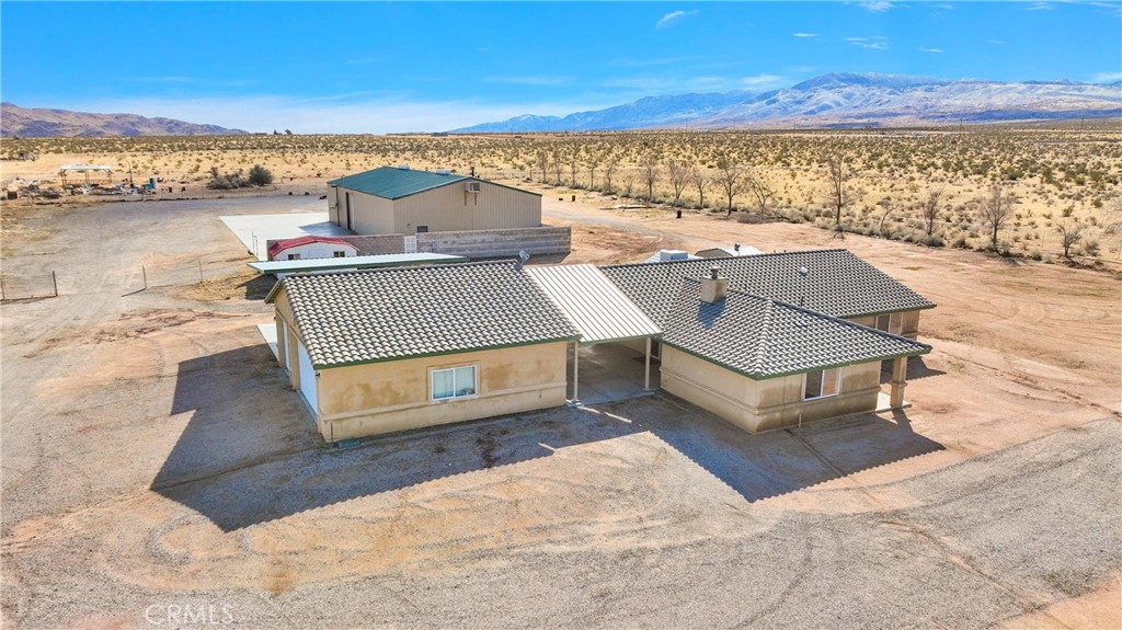 A property available for sale at 11575 Tujunga Road, Apple Valley, CA 92308.