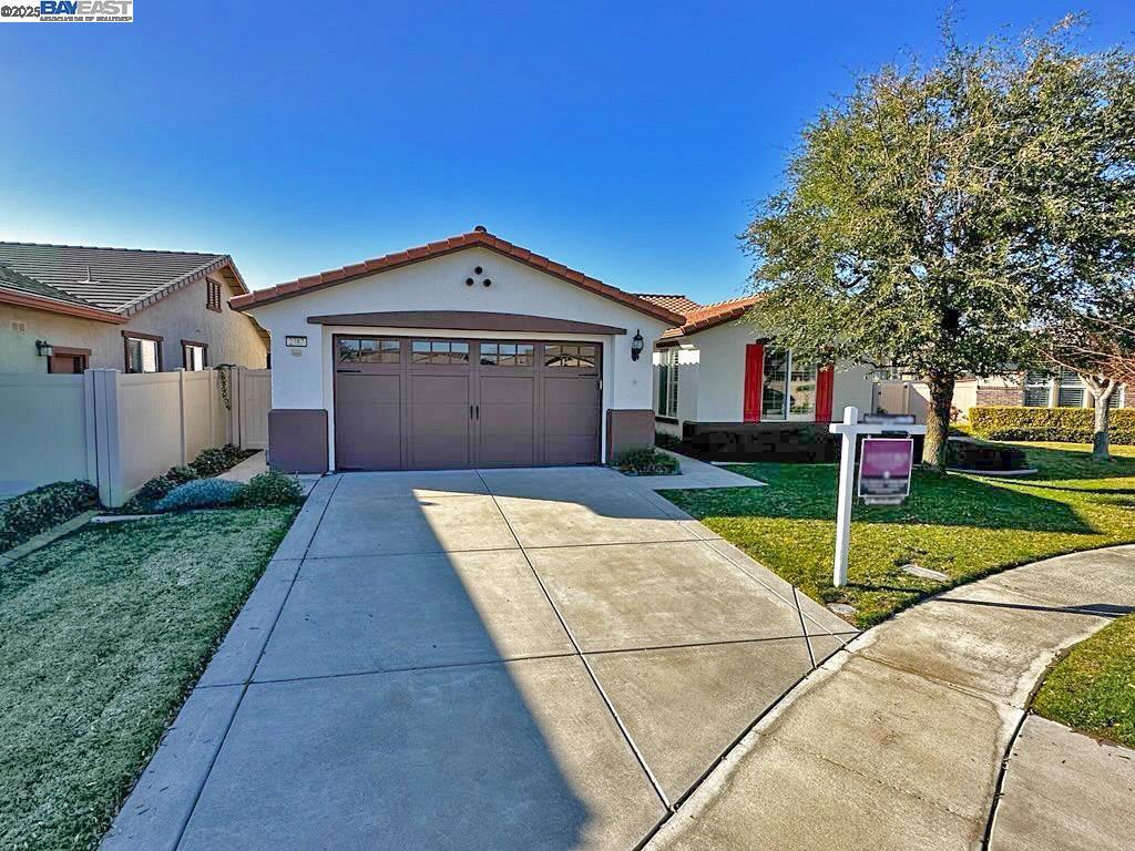 A property available for sale at 2387 Birdsong Pl, Manteca, CA 95336.