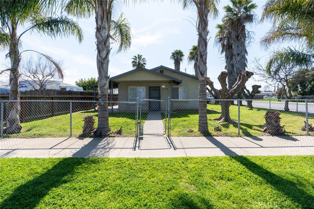 A property available for sale at 9566 E Broadway Street, Planada, CA 95365.