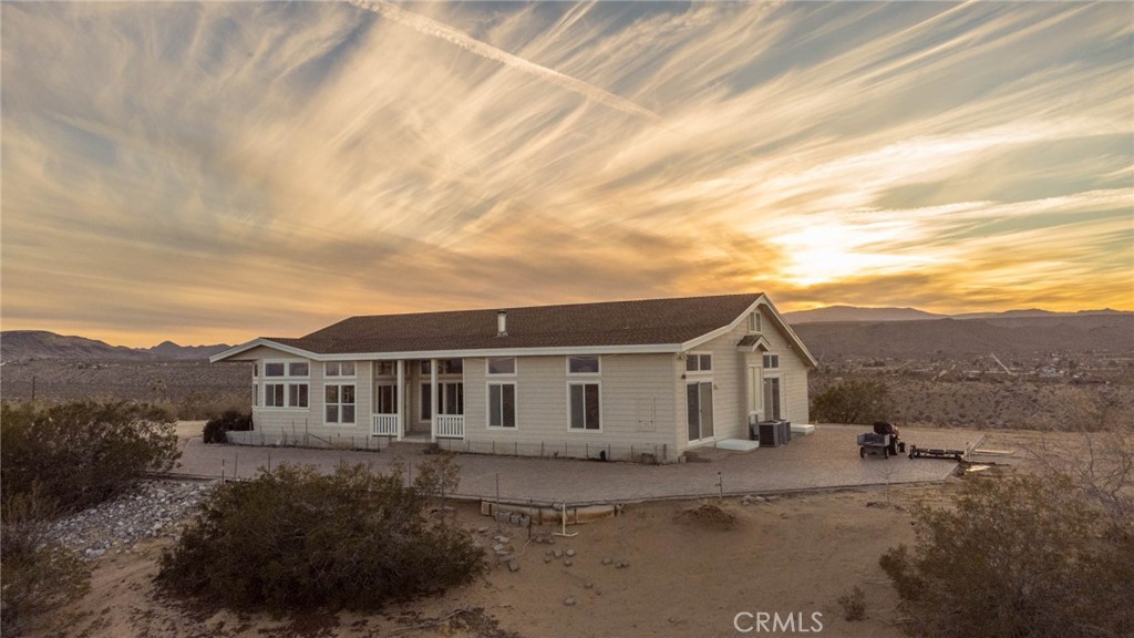 A property available for sale at 57120 Luna Vista Lane, Landers, CA 92285.