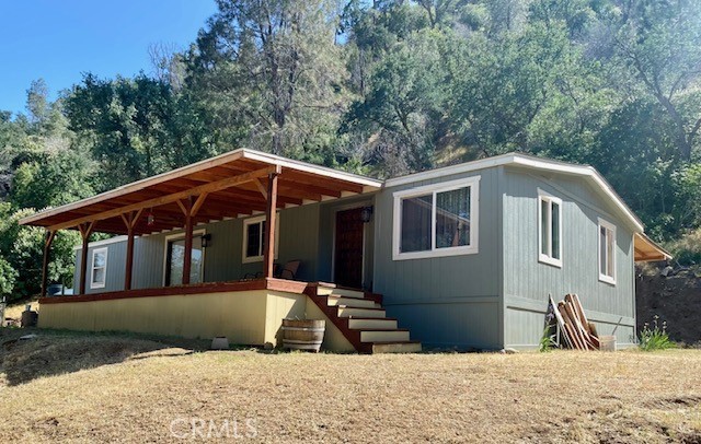A property available for sale at 46777 Los Gatos Road, Coalinga, CA 93210.
