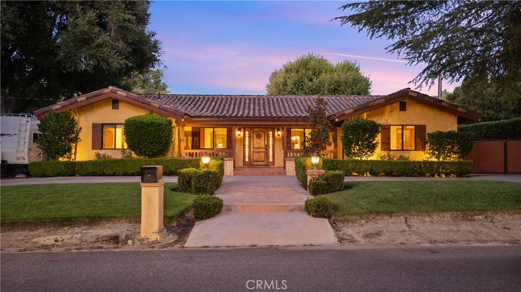 A property available for sale at 24604 Apple Street, Newhall, CA 91321.