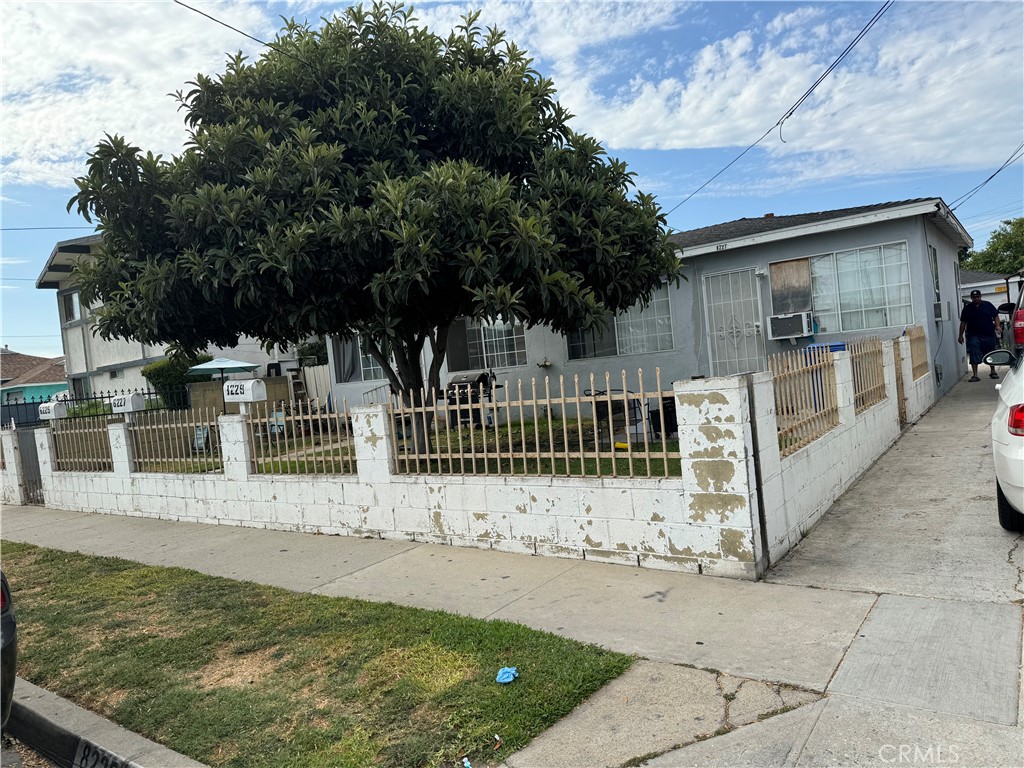A property available for sale at 8225 2nd Street, Paramount, CA 90723.