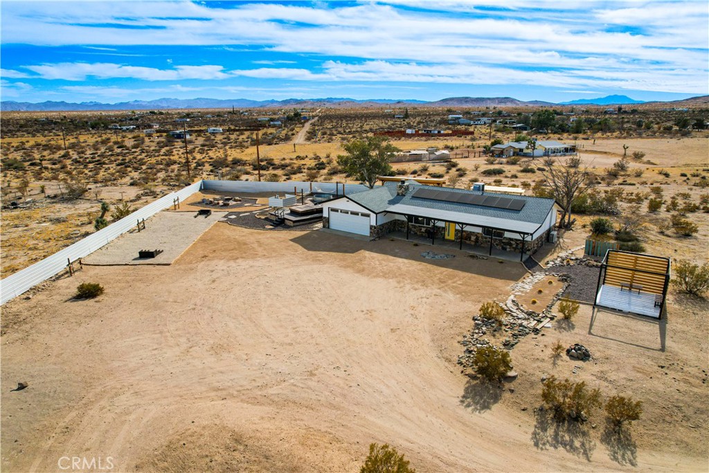 A property available for sale at 129 Bowman Trail, Landers, CA 92285.