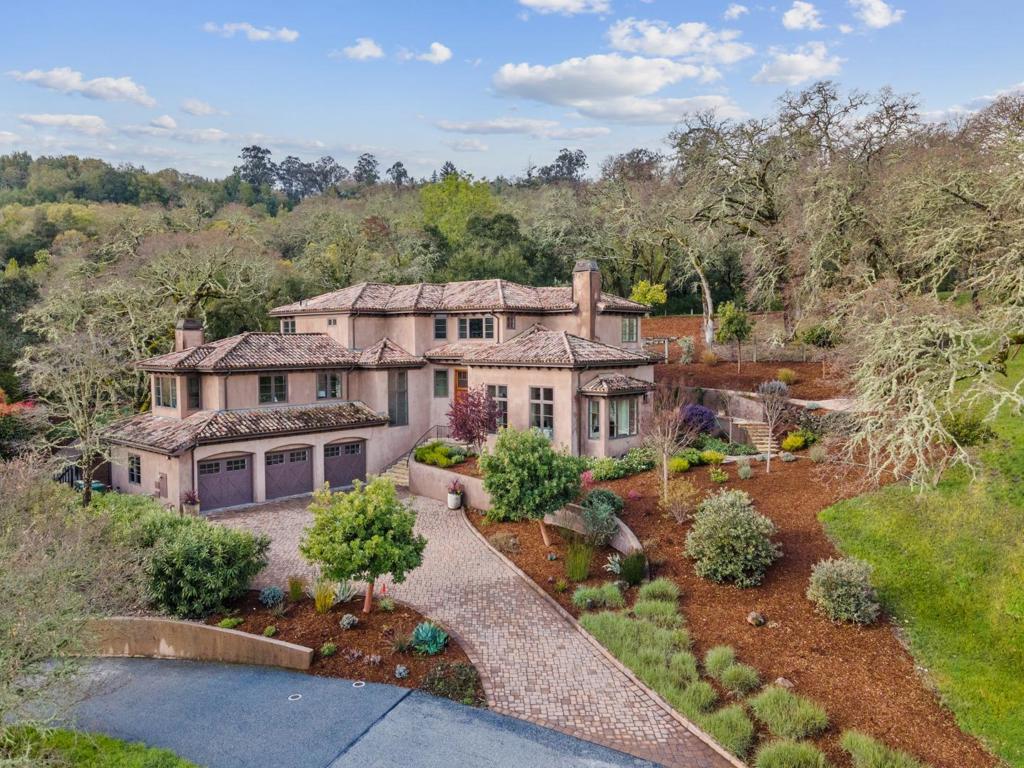 A property available for sale at 4 Buck Meadow Drive, Portola Valley, CA 94028.