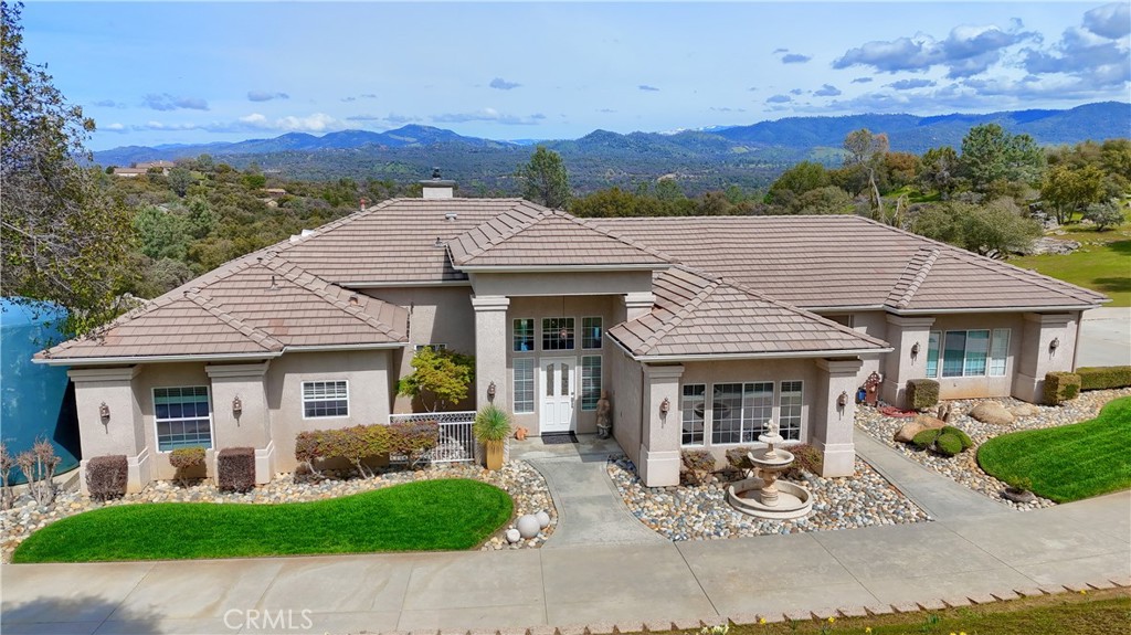 A property available for sale at 31008 Longview Lane E, Coarsegold, CA 93614.
