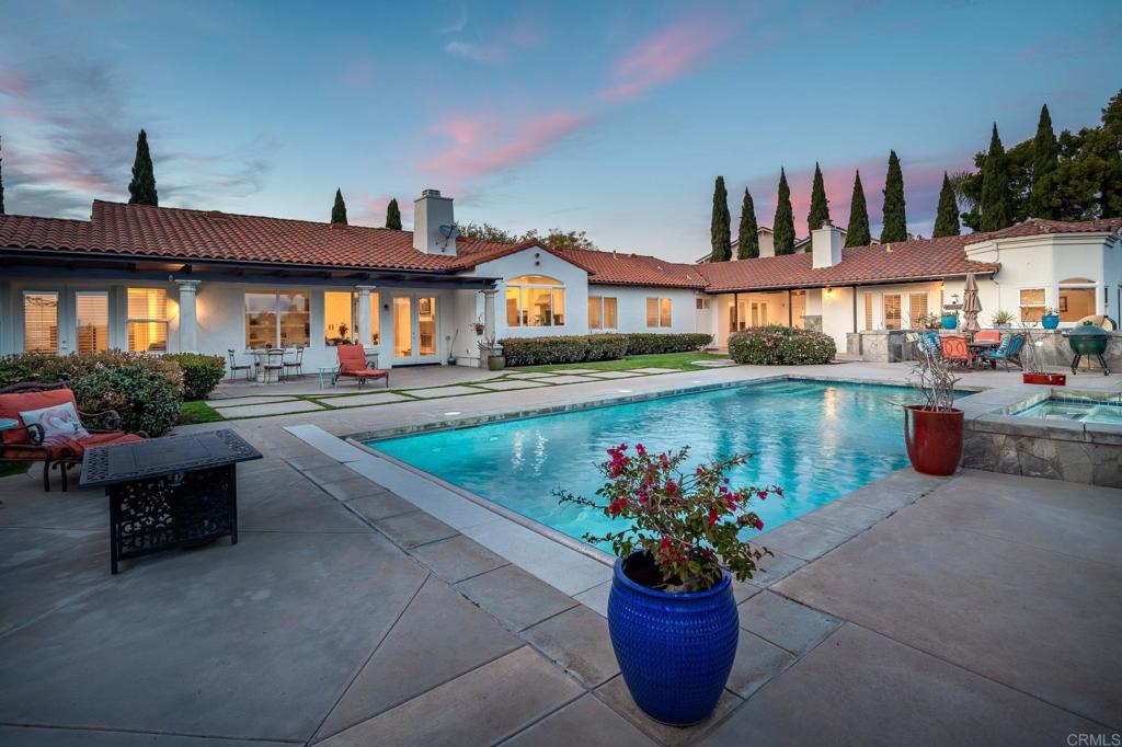 A property available for sale at 7992 Paseo Esmerado, Carlsbad, CA 92009.