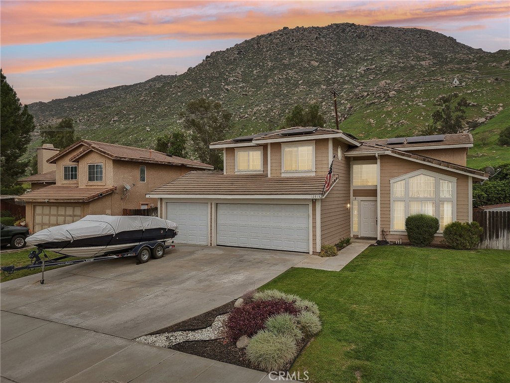A property available for sale at 12815 Mike Todd Lane, Grand Terrace, CA 92313.