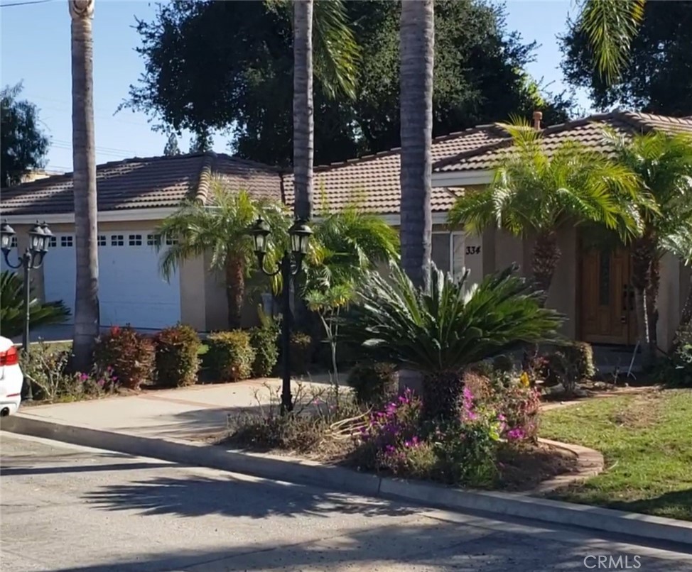 A property available for sale at 330 334 Moore Lane, San Dimas, CA 91773.